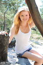 Free naked nude gallery posing between trees