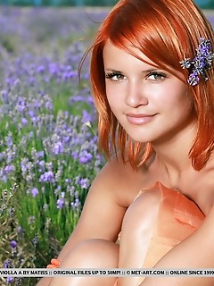 Violla a redhead violla a bares her sexy, tanned body and smooth pussy in the meadows.
