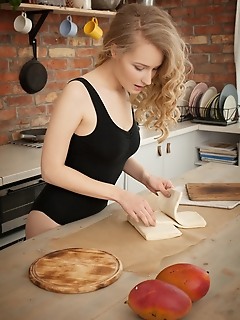 Naomi kiss newcomer naomi kiss flaunts her yummy body and meaty pussy in the kitchen.