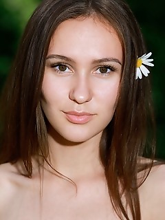 Belonika "like a muse or woodland nymph, belonikas elegant beauty, sweet smile, and nubile body stands out in the verdant surroundings"