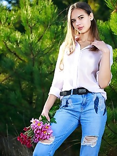 Valencia valencia strips outdoors baring her perky tits and shaved pussy.