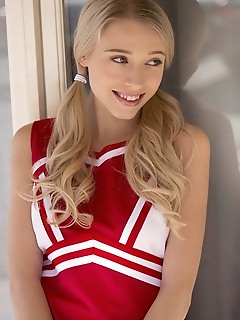 Riley anne cheerleader riley anne shows off her beautiful tits and trimmed pussy.