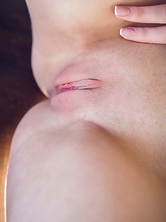 Kery kery bares her meaty ass and delectable pussy on the table.