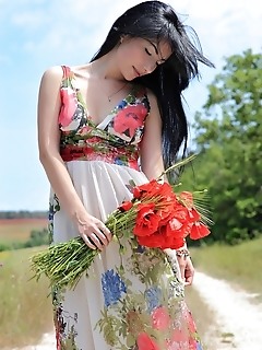 Smooth fair skin, womanly curves, and a pair of perfectly puffy nipples among fresh and vivid surroundings.