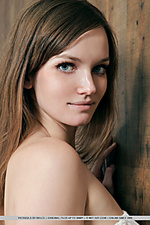 Unpretentious beauty with the potential to captivate with her natural charm and innocent appeal.