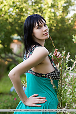 Sensual outdoor shoot with softcore appeal and ravishing energy.