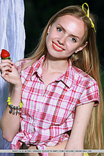 Honey liz honey liz flaunts her petite body with small tits as she poses in front of the camera.