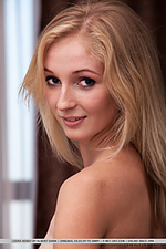 Leona honey leona honey looks stunning in a powder blue matching lingerie that compliments her blonde hair, fair skin, and striking blue eyes
