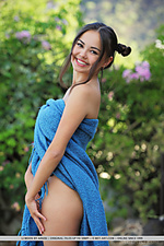 Li moon li moon playfully posing with a blue, fringed wrap as she shows off her beautiful, pink and puffy nipples, meaty ass, and shaved cunt by the poolside