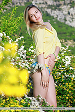 Amaly amaly bares her gorgeous body and delectable pussy as she delightfully poses among the beautiful flowers.