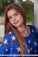 Sigrid sigrid flaunts her smooth, pink pussy as she poses by the window.