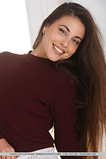 Lorena b the gorgeous lorena b confidently posing as she takes off her crimson sweater and lace panty
