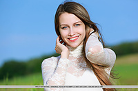 Violet violet delightfully poses outdoors as she spreads her legs, baring her sweet pussy.