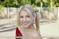 Gloia newcomer gloia bares her shaved pussy as she rides her in-line skates.