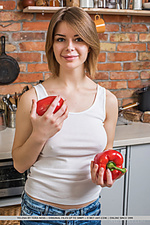 Yelena busty yelena serves her luscious body in the kitchen.