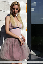 Kira w kira w strips outdoors as she bares her sexy, slender body.