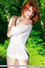 Violla a redhead violla a strips by the river baring her sexy body and sweet pussy.