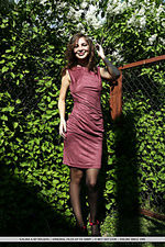 Galina a galina a flaunts her gorgeous tits and sexy legs as she strips on the bed.