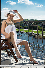 Faina bona faina bona playfully poses in the balcony as she bares her nubile body.