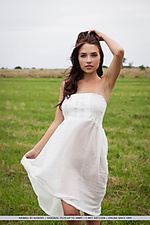 Niemira niemira bares her smoking hot body as she sensually poses in the field.